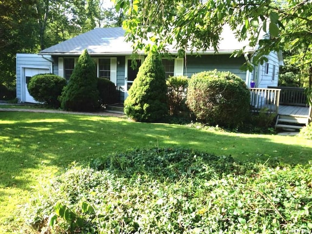 ranch-style house with a front lawn