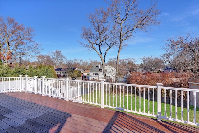 deck featuring a yard