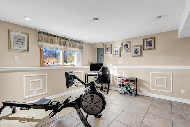 exercise area with light tile patterned floors