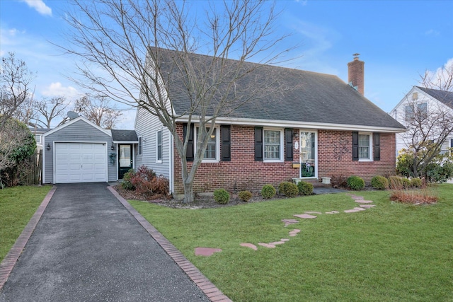 view of front of house with a front lawn and a garage