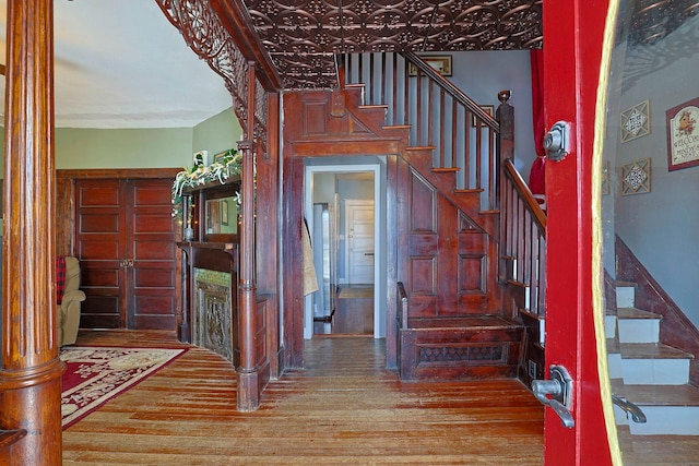 stairway featuring hardwood / wood-style floors