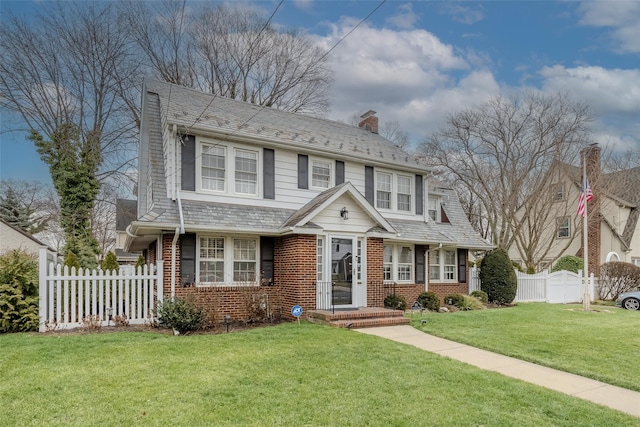 view of front of home with a front yard