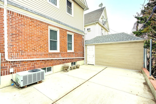 exterior space featuring a patio area and central AC