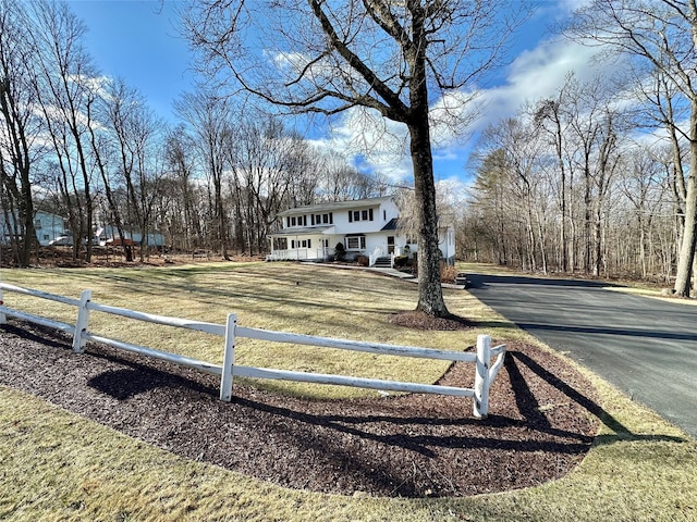 view of front of property with a front lawn