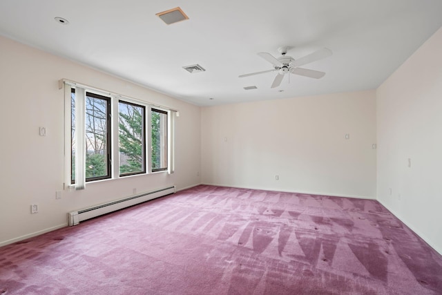 carpeted spare room featuring ceiling fan and a baseboard radiator