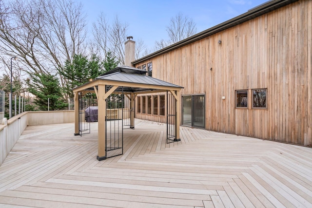 wooden deck with a gazebo