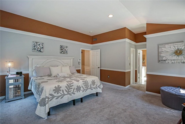 carpeted bedroom with vaulted ceiling