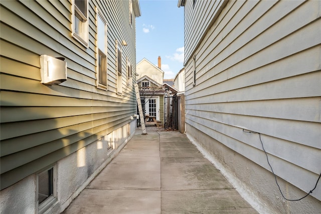 view of property exterior featuring a patio area