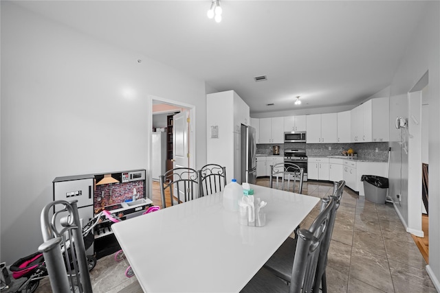 view of tiled dining area