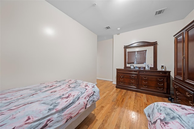 bedroom with light hardwood / wood-style flooring