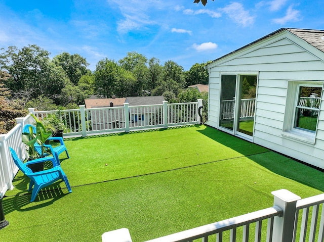 view of yard with a deck