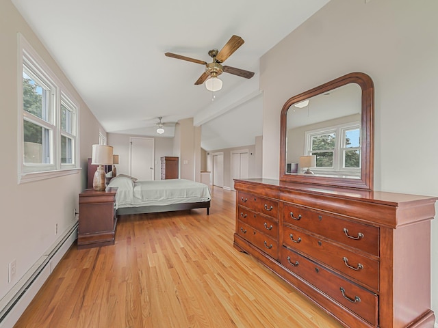 bedroom with baseboard heating, light wood-type flooring, ceiling fan, and vaulted ceiling with beams