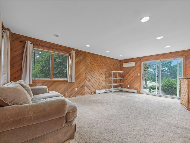 living room with wood walls, a wall unit AC, and carpet