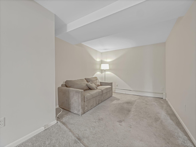 living room with light colored carpet and a baseboard radiator