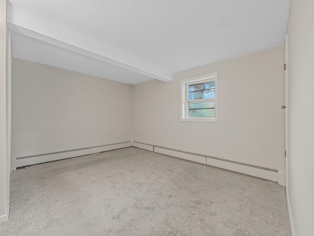 carpeted empty room featuring beamed ceiling and a baseboard heating unit