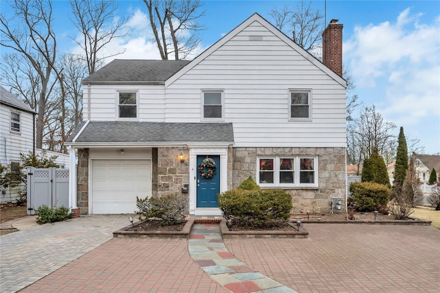 view of front of property featuring a garage