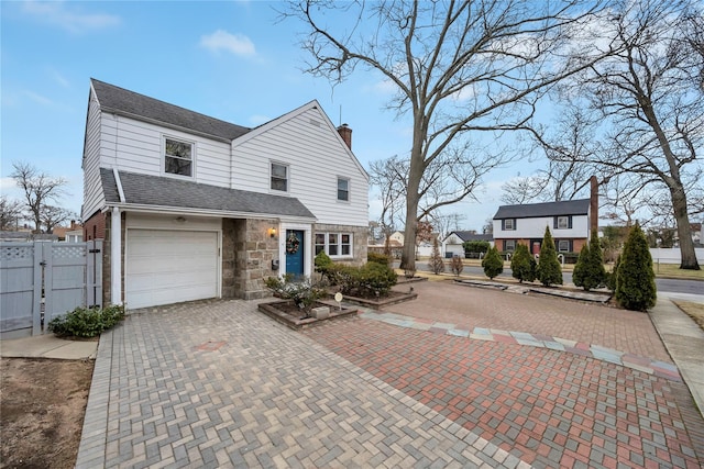 view of front of property with a garage