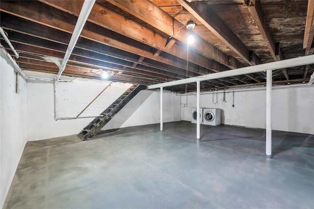 basement featuring independent washer and dryer