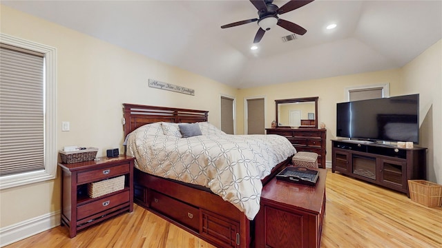 bedroom with light wood finished floors, baseboards, visible vents, and recessed lighting