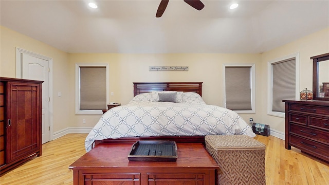 bedroom featuring recessed lighting, light wood-style flooring, and baseboards