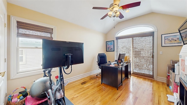 office with light wood-style floors, lofted ceiling, ceiling fan, and baseboards