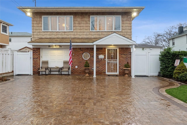 view of property featuring a garage