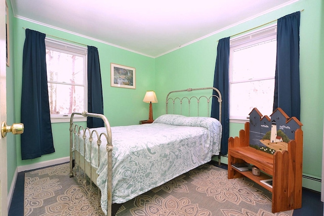 bedroom with multiple windows and crown molding