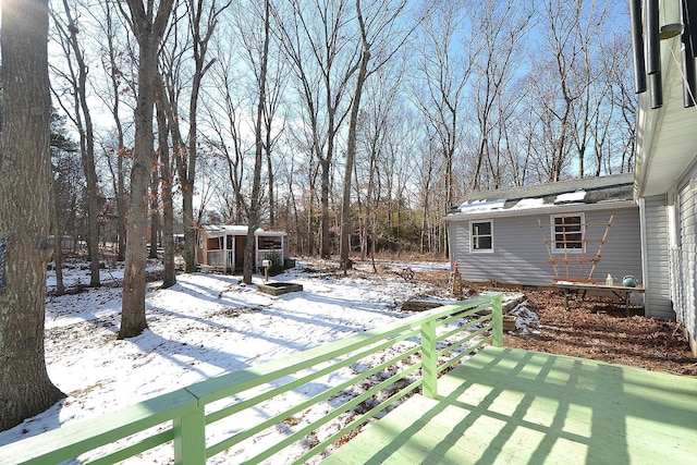 view of yard covered in snow