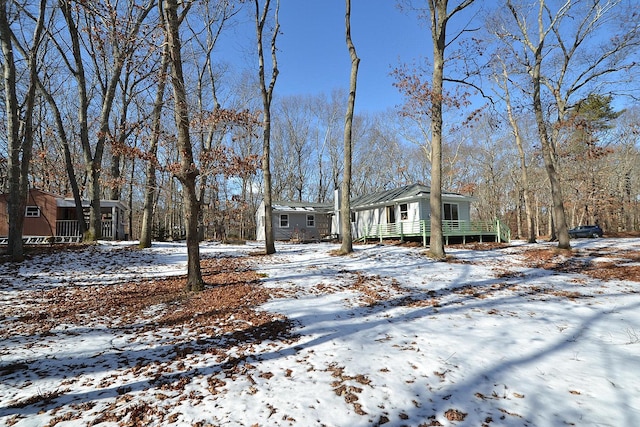 view of yard covered in snow