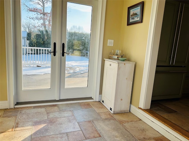 entryway featuring french doors