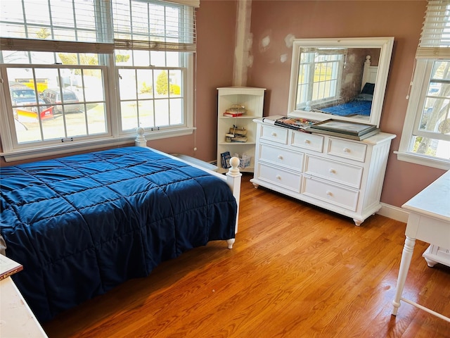 bedroom with light hardwood / wood-style flooring