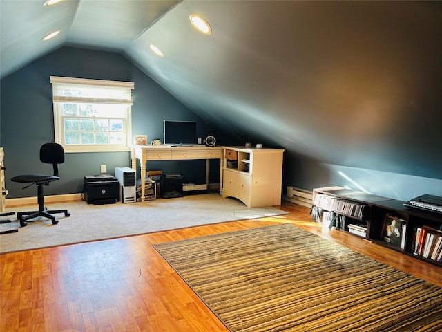 interior space featuring lofted ceiling and light wood-type flooring