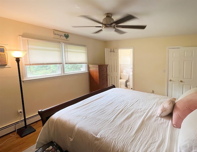 bedroom featuring ceiling fan, connected bathroom, and hardwood / wood-style floors