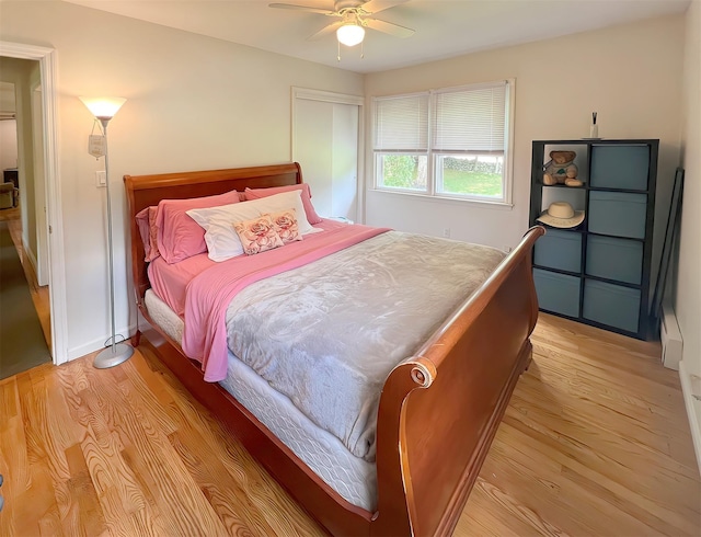 bedroom featuring ceiling fan and light hardwood / wood-style floors