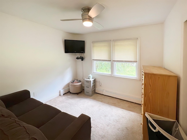 interior space featuring light carpet, ceiling fan, and a baseboard radiator