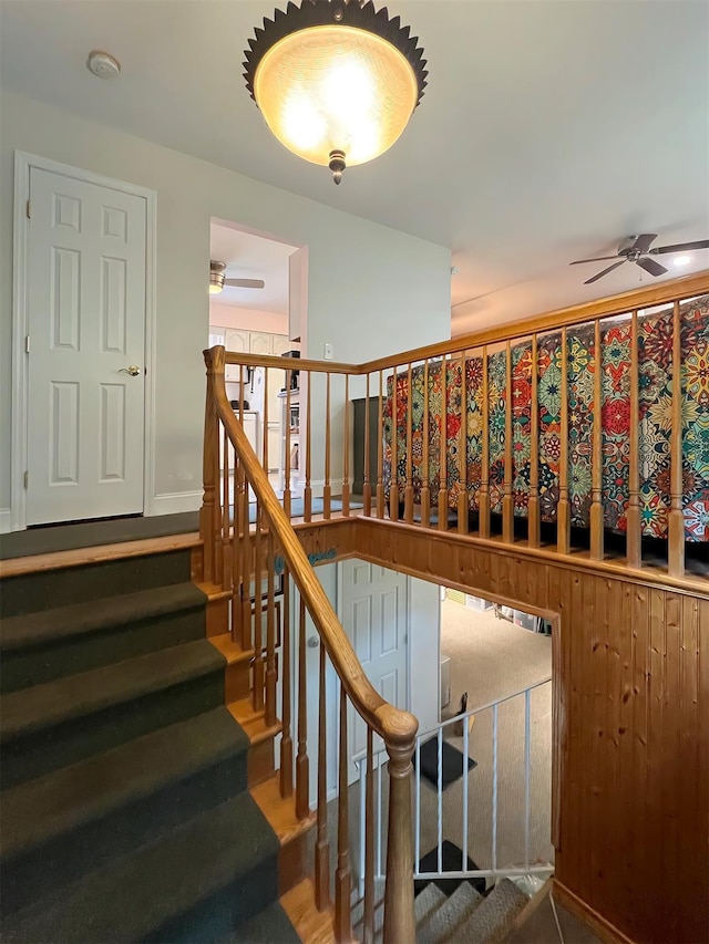 staircase with ceiling fan