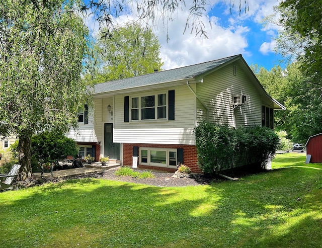 view of front of home with a front lawn