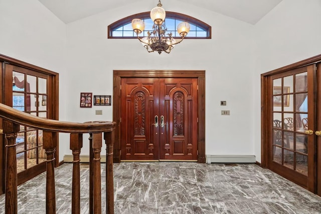 entryway with french doors, high vaulted ceiling, a chandelier, and a baseboard heating unit