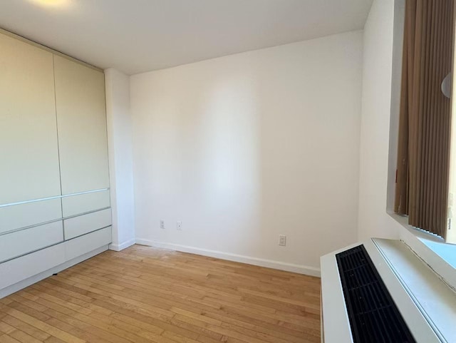 empty room featuring light hardwood / wood-style floors