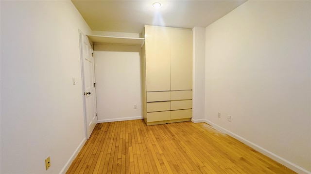 unfurnished bedroom with light hardwood / wood-style floors