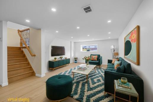 living room with light hardwood / wood-style floors