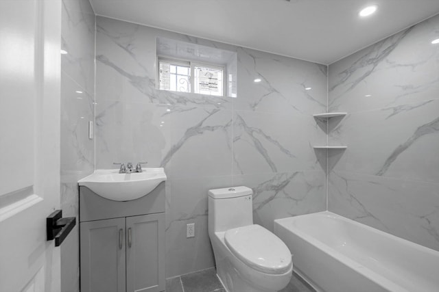 full bathroom featuring toilet, vanity, and shower / tub combination