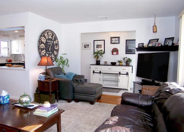 living room featuring light hardwood / wood-style flooring