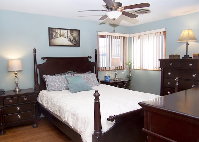 bedroom featuring ceiling fan and wood-type flooring