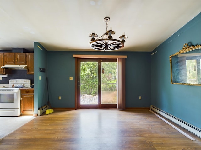 kitchen featuring white range with electric stovetop, a baseboard radiator, a chandelier, and hanging light fixtures