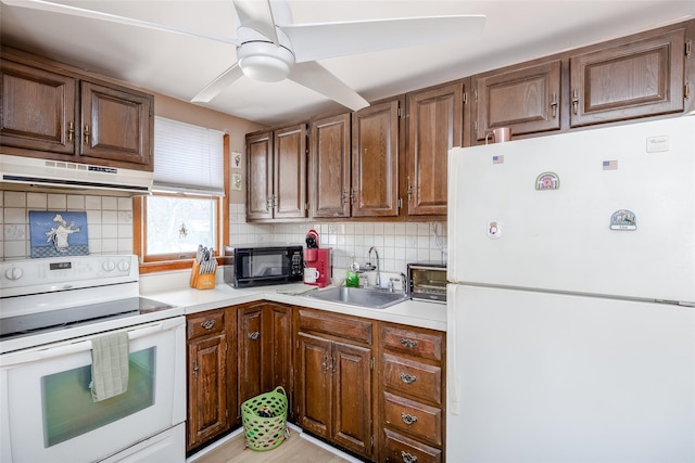 kitchen with tasteful backsplash, sink, white appliances, and ceiling fan