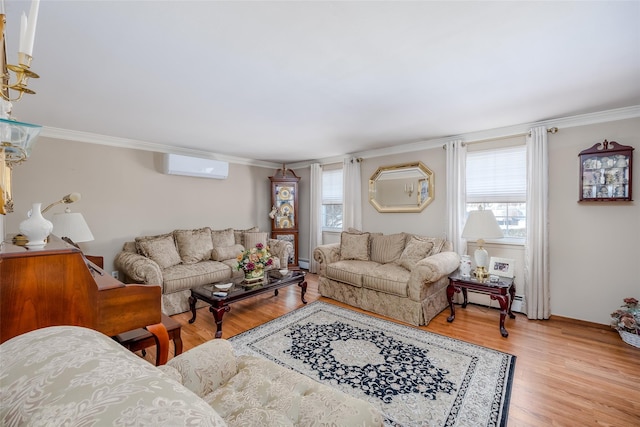 living room with ornamental molding, a wealth of natural light, light hardwood / wood-style floors, and a wall mounted AC