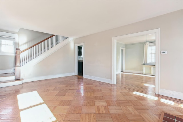 53 S Grove St S, Valley Stream, NY 11580 - unfurnished living room featuring light parquet floors