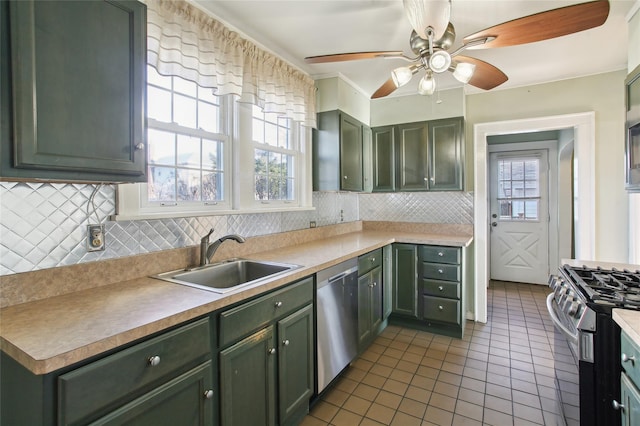53 S Grove St S, Valley Stream, NY 11580 - kitchen featuring sink and green cabinetry