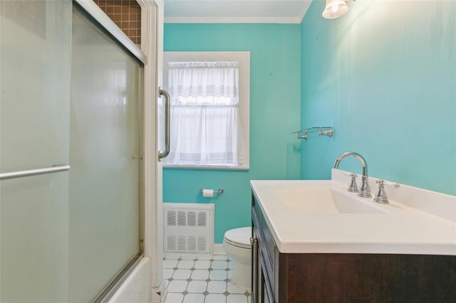 53 S Grove St S, Valley Stream, NY 11580 - full bathroom featuring vanity, shower / bath combination with glass door, and toilet
